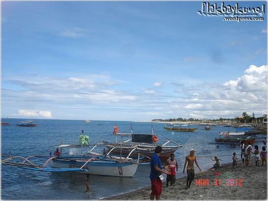 Pundaquit Beach, the jump-off point to the beautiful coves of Zambales via boat ride.